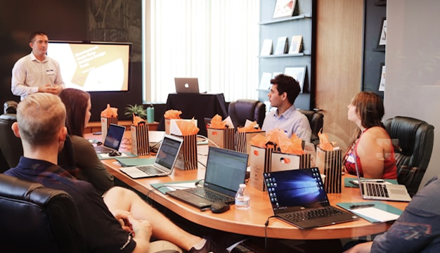 Marketing team converting a pitch deck into a video using Visla’s AI-powered PPT to video tool to create branded content fast.